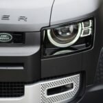 a close up of the headlights of a car